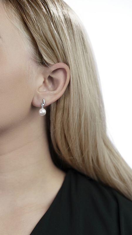 Model is wearing Lois earrings with 9-10mm AAAA quality pearls